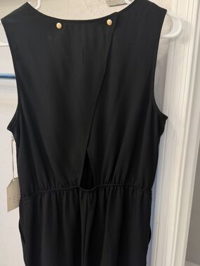 Trindy Clozet Boutique Black Sleeveless Mini Dress with Gold Button Detail